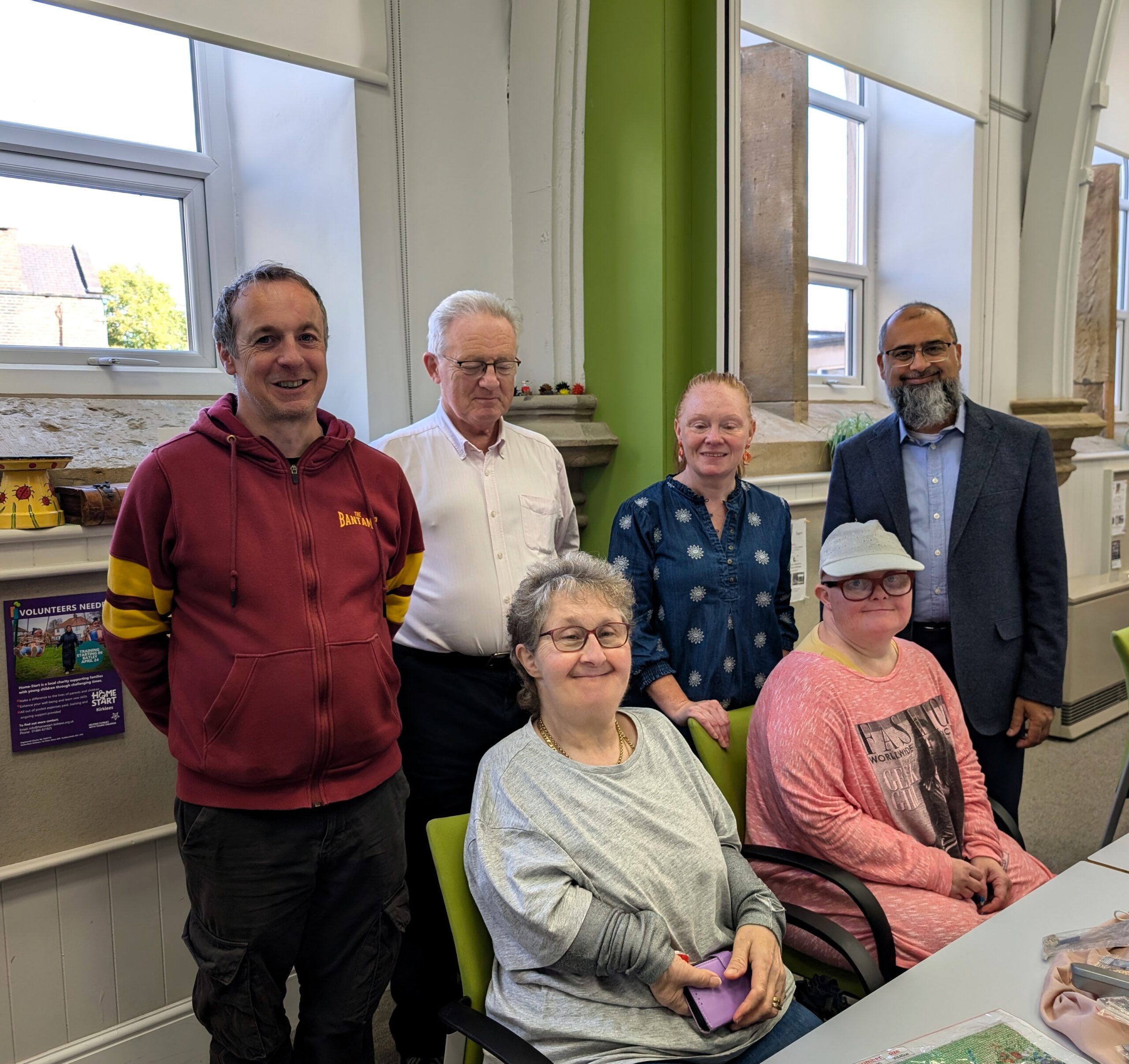 Image shows Iqbal mohamed MP for Dewsbury and Batley with staff and members of Howlands